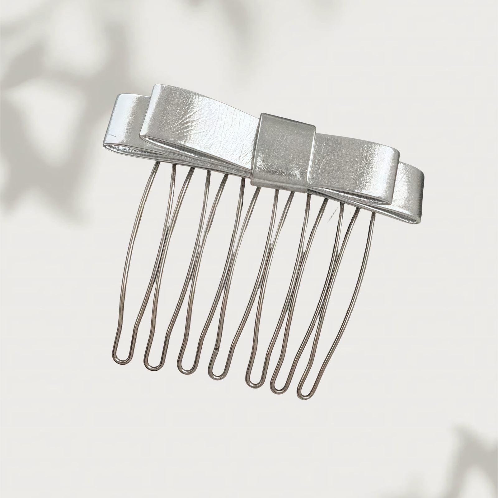 silver bow comb